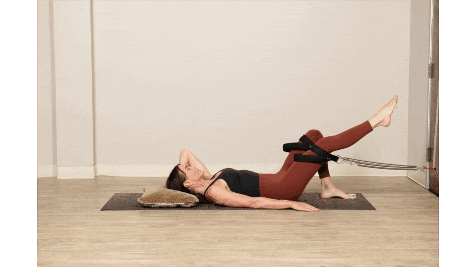 Single Leg Rev Crunch With Rotation